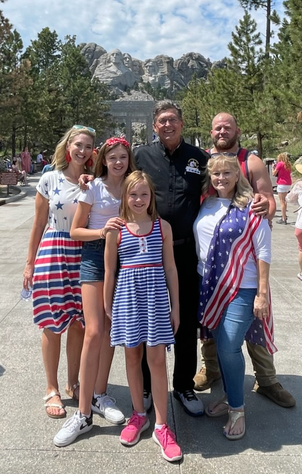 Sheriff Mack and his wife Dawn with family at Mt. Rushmore